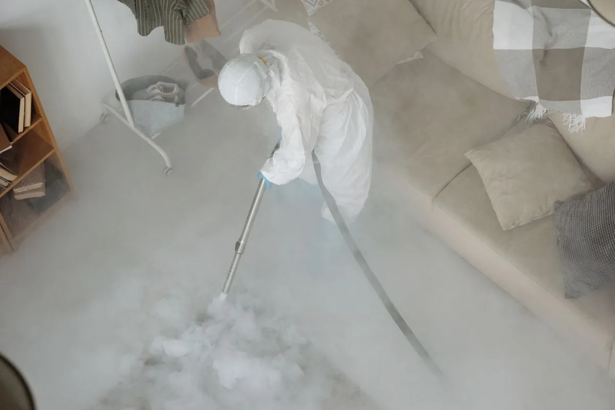Biohazard cleanup technician in protective equipment, Oberlin, LA